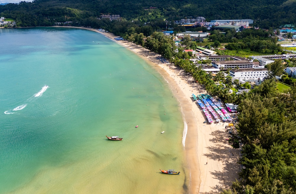 Aerial view of Kamala Beach, home to plenty of places to visit in Phuket with family.